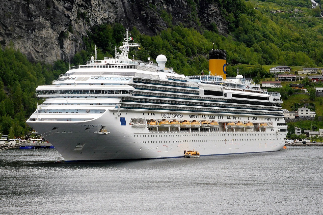 Celebrity Apex cruise ship in Norwegian fjords with mountains